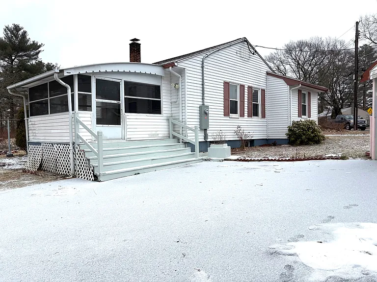 View from driveway, showing screen porch