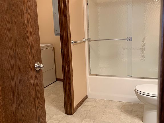 Guest bathroom into laundry 