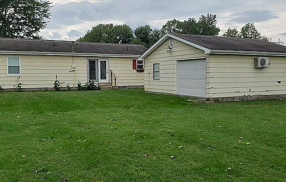 Back Showing Detached Garage