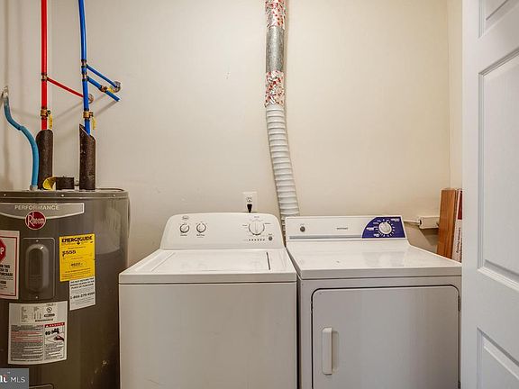 Water closet, washer and dryer