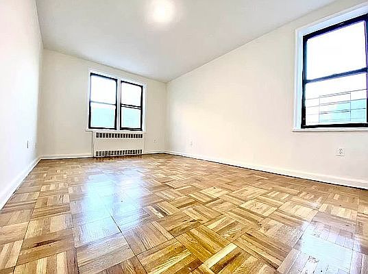 5th image of 66-20 Wetherole St #1G