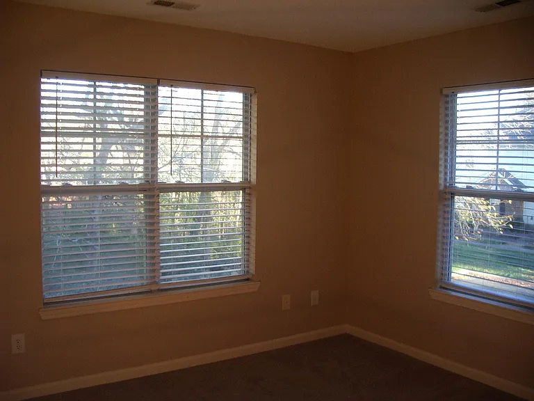Upstairs - 2nd Bedroom. End unit has additional windows.