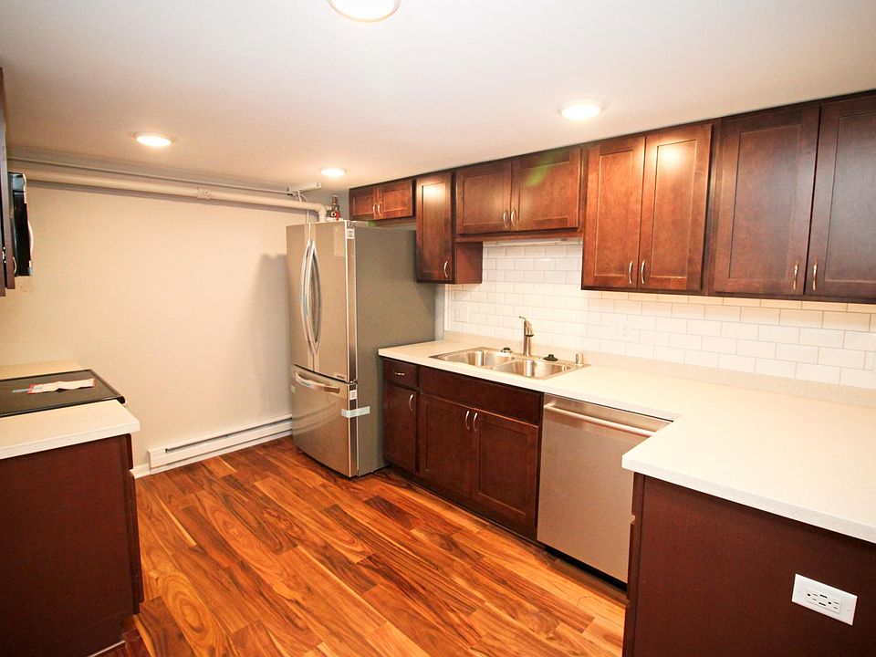 Fully renovated kitchen with tile backsplash