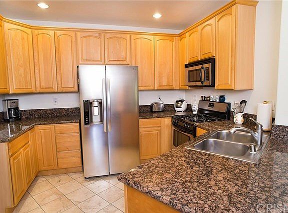 Granite counters & lots of cabinets.
