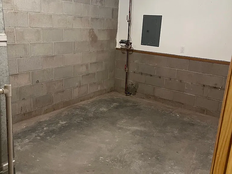 Lower level utility/storage room.