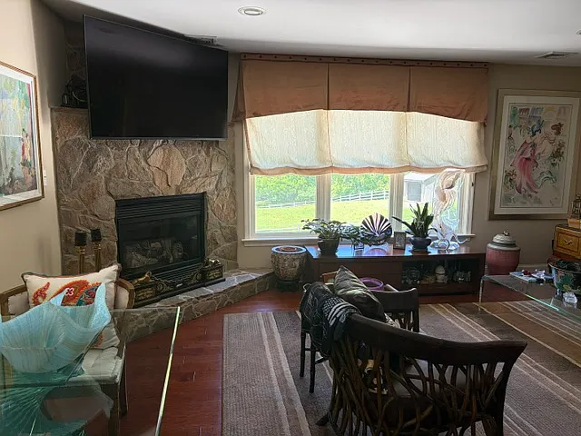 Stone Fireplace; View of Fields from Living Room