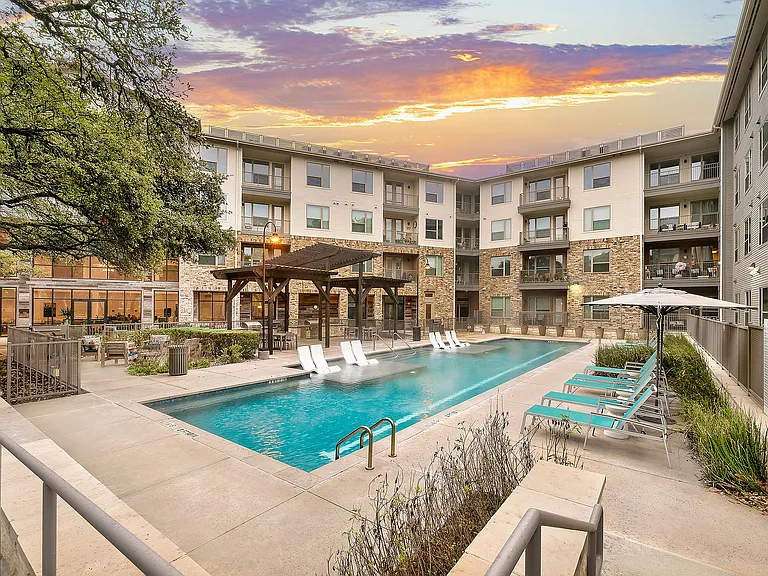 Outdoor Pool with Sunset