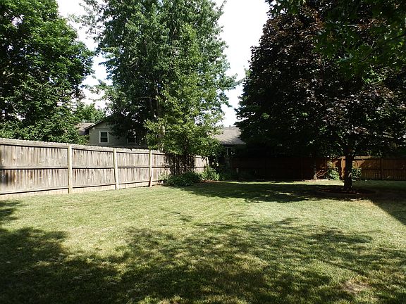 back yard looking at fenced area