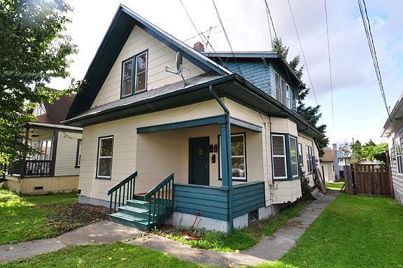 Entry with covered front porch and room to garden.