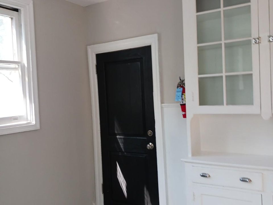 Kitchen (This door leads to the back staircase of the building that can be used to take out trash)
