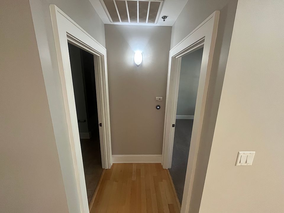 Entrance to Bedroom One and Bathroom One off of Living Room