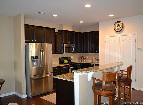 5th image of 7031 Woodsbay Ln #0