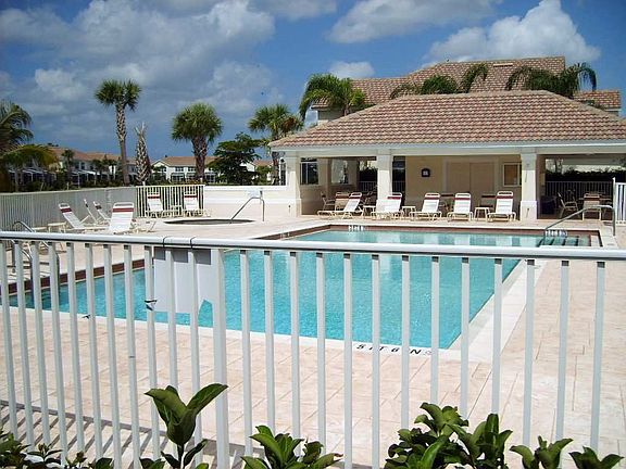 LOCATED ACROSS FROM THE POOL