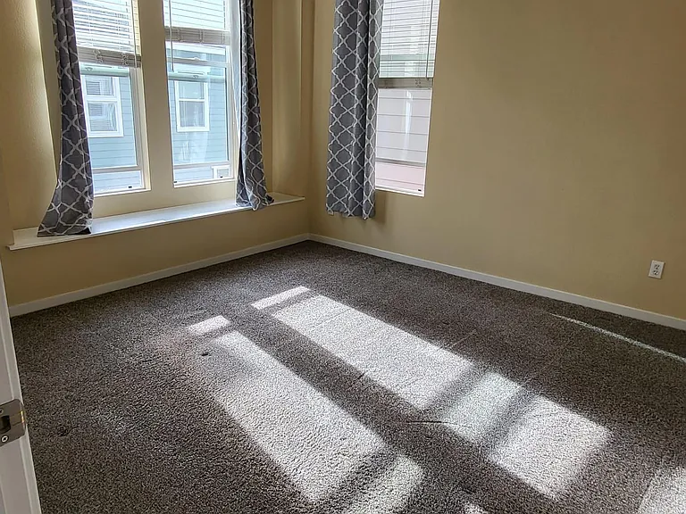 Master bedroom with 2 spacious closets and access to attic