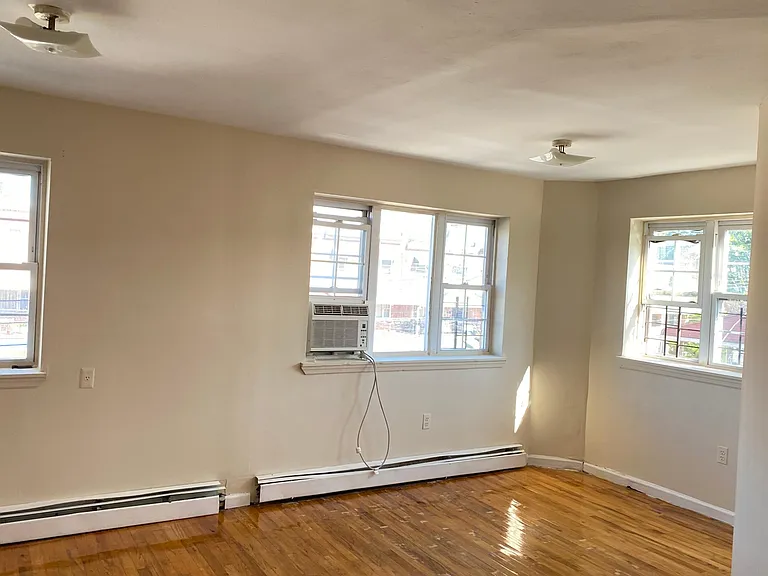 Master bedroom with three sets of windows