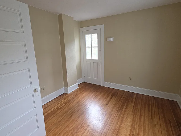 Bedroom 3, door leads to a balcony