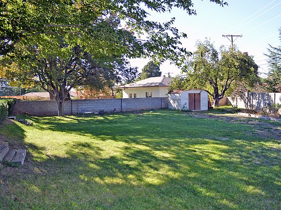 Huge backyard with mature trees!