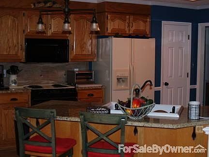 GRANITE AND TILE
						:
						Spacious