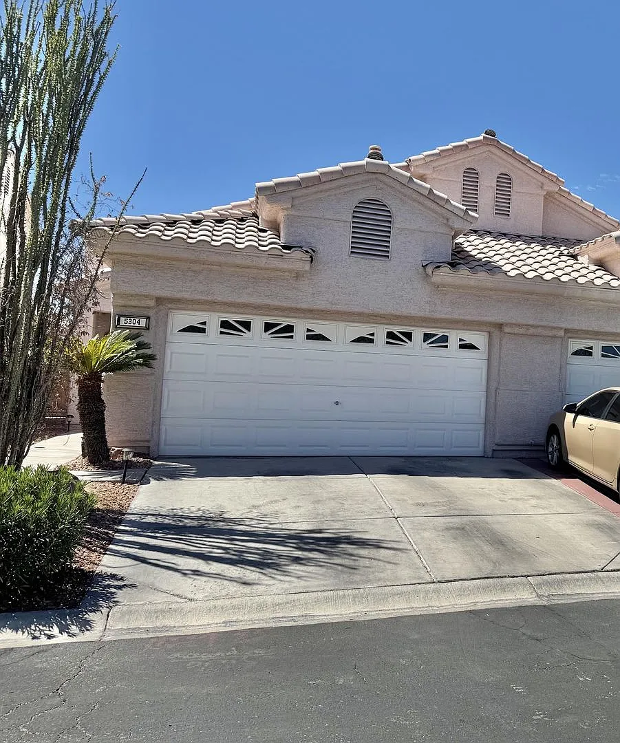 Stunning 2-bedroom, 2.5-bathroom two-story townhouse nestled inside a gated community — Photo 1