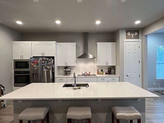 Quartz countertops and stainless-steel appliances