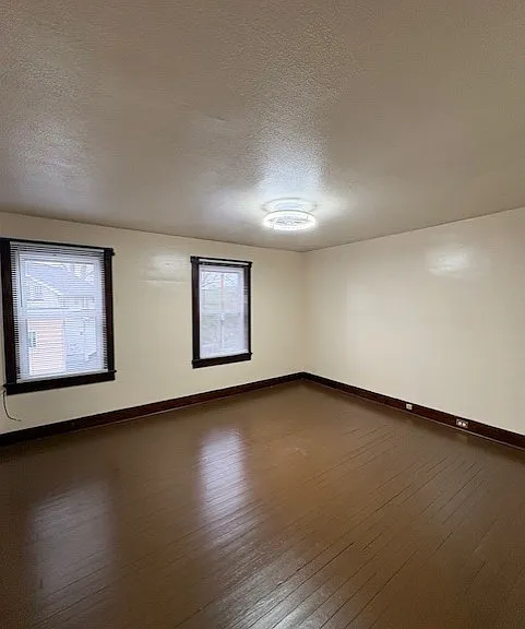Large bedroom with new light fixture
