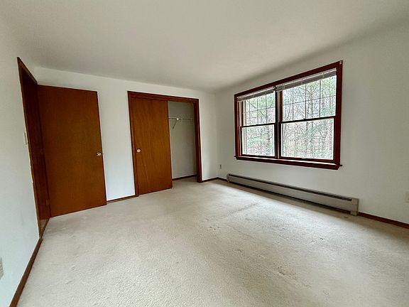 Closet in primary bedroom