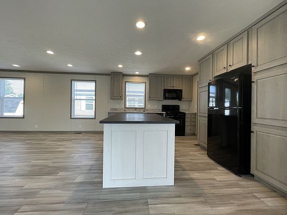 3rd image of 7204 E Grand River Ave Lot 465