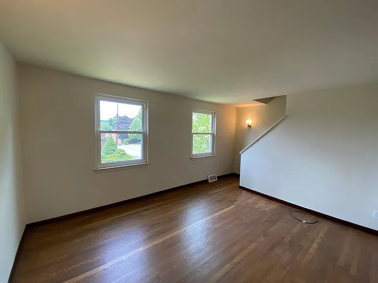 Living room. All hardwood floors are newly refinished. Cable-ready.