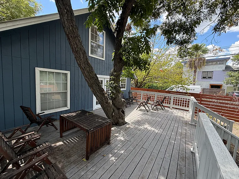 Large deck and back yard with shade from an old Pecan tree!