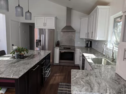 Upgraded kitchen with stainless steel appliances and granite countertops - 6556 Big Horn Trl