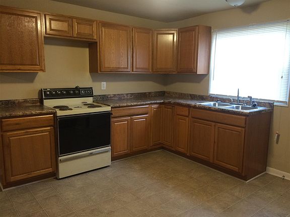 Spacious updated kitchen. Beautiful cabinets!