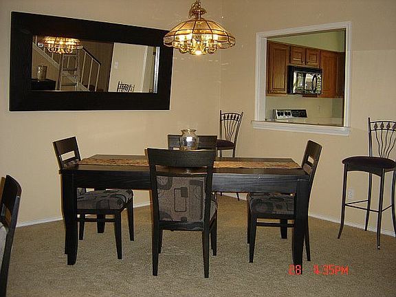 Dining room is large enough to accommodate a large dining arrangement.