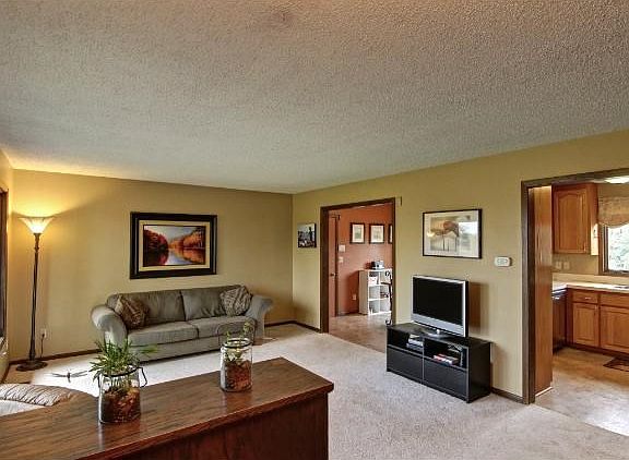 Relax in this spacious Upstairs Living Room with a large window overlooking your professionally landscaped front yard!