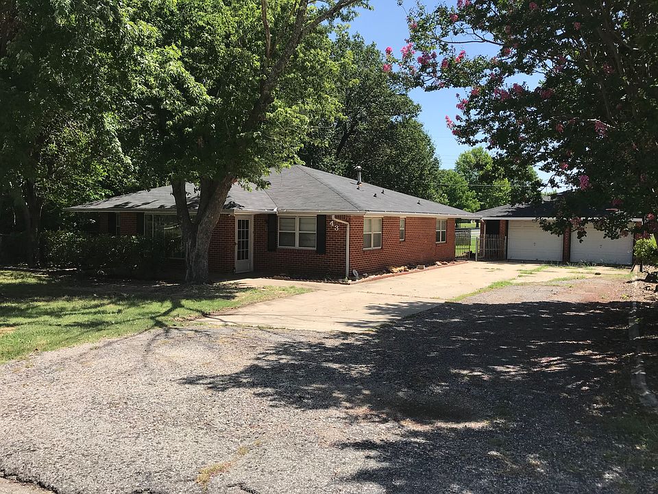 Front view of home & Garage