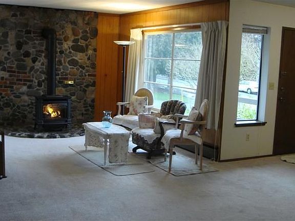 Large living room with gas free standing stove
