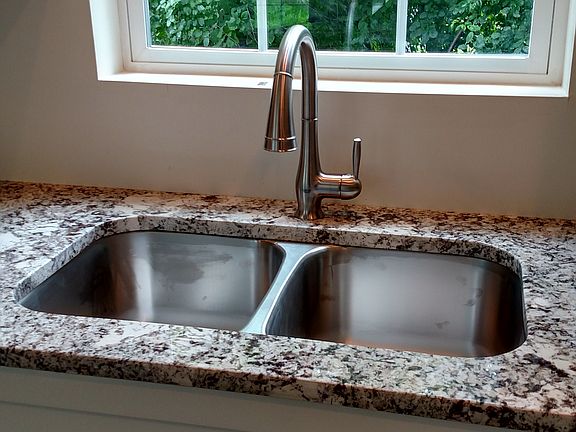 Granite & All wood cabinets