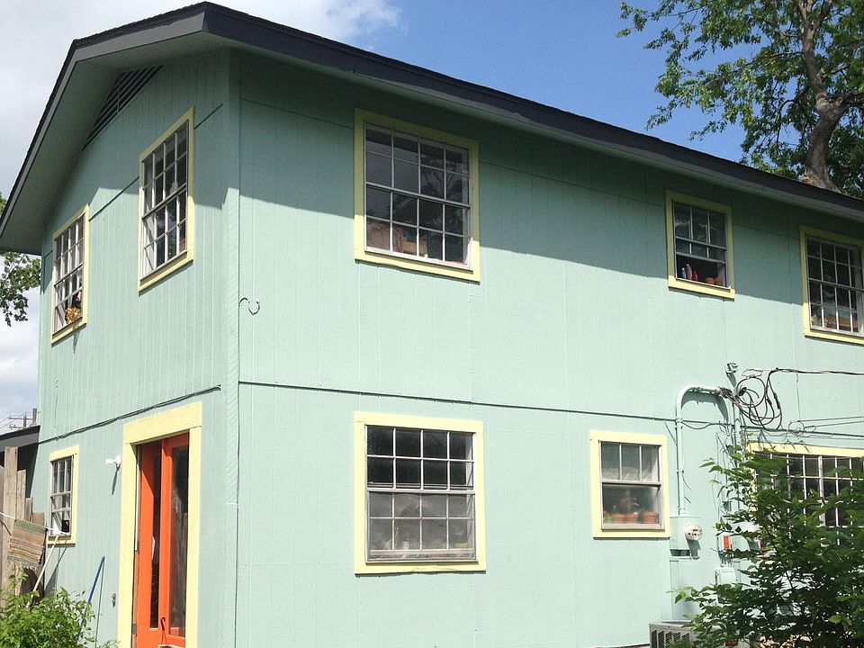 Colorful house with giant private, fenced yard