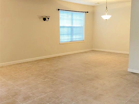 Enter this home with 2 large formals, and study in the front.