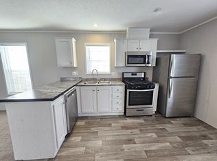 107 Beech Ave #107, Highland, MI 48357