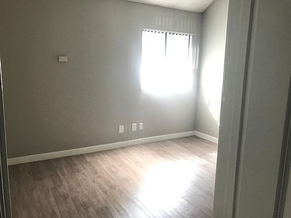 Bedroom 1; Check out that sunlight against the modern grayed