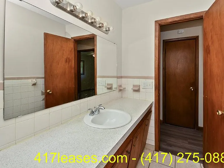 203 S White Oak Ave — Photo 27