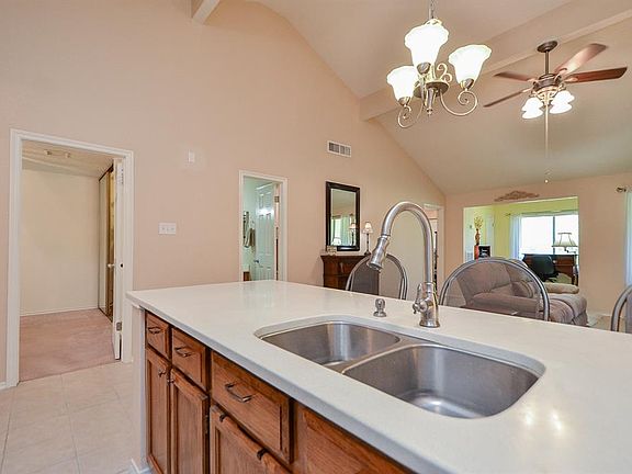 The quartz counter tops, SS sink and faucet are some of the recent items updated in the kitchen.
