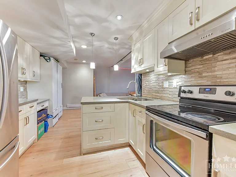 7437 Garfield Dr — Photo 5