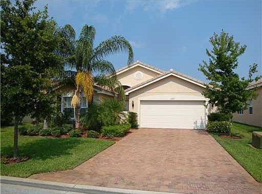 Beautiful Falcon Trace home, with great lawn, and beautiful landscaping.
