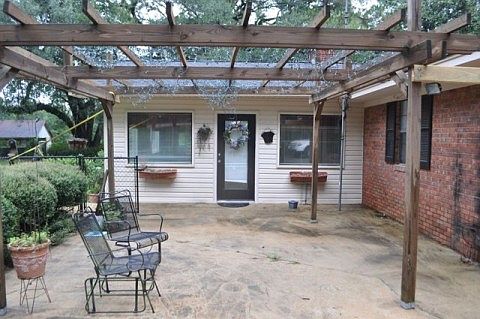Enjoy outdoor living under this arbor