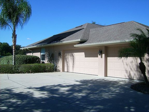 Side exterior/three car garage 