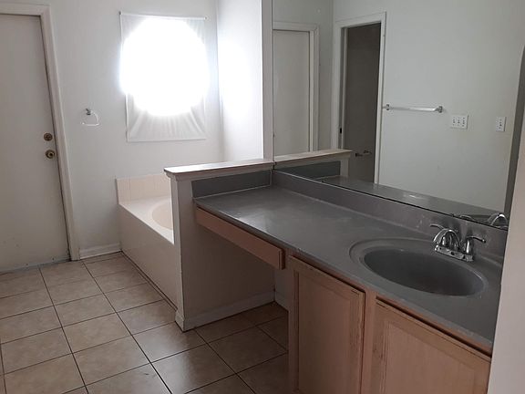 Master bathroom with large bath