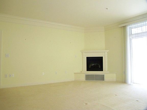 Fireplace Living Room with slider access to balcony
