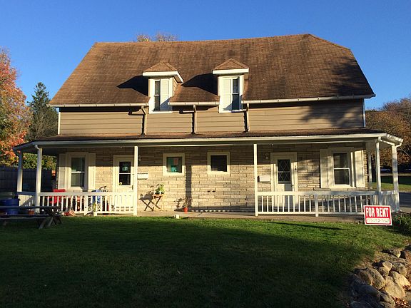 Apartment for rent is on right side of two family house.