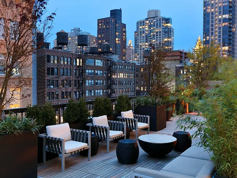 City terrace with lounge chairs